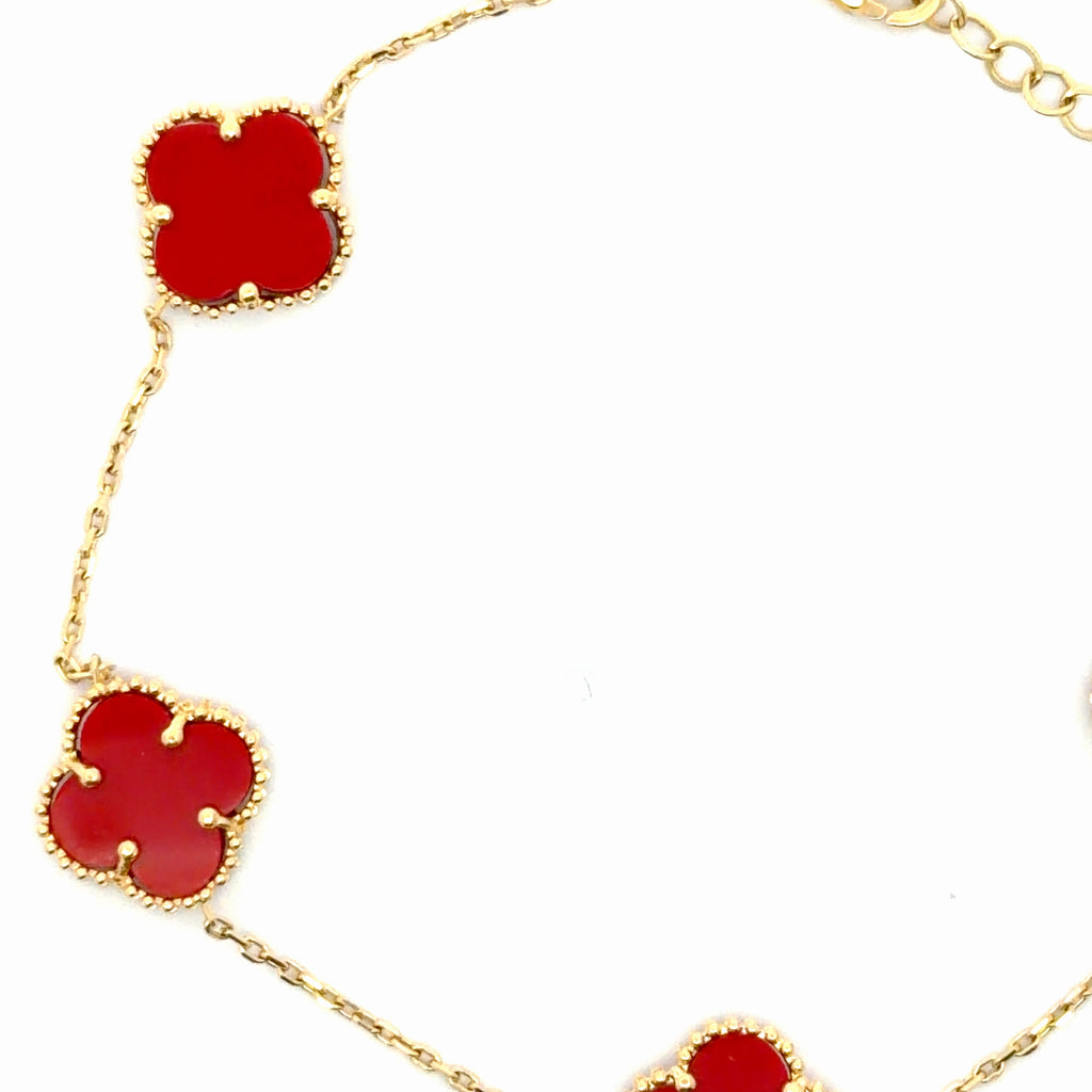 Elegant Yellow Gold Chain Bracelet with Red Clovers