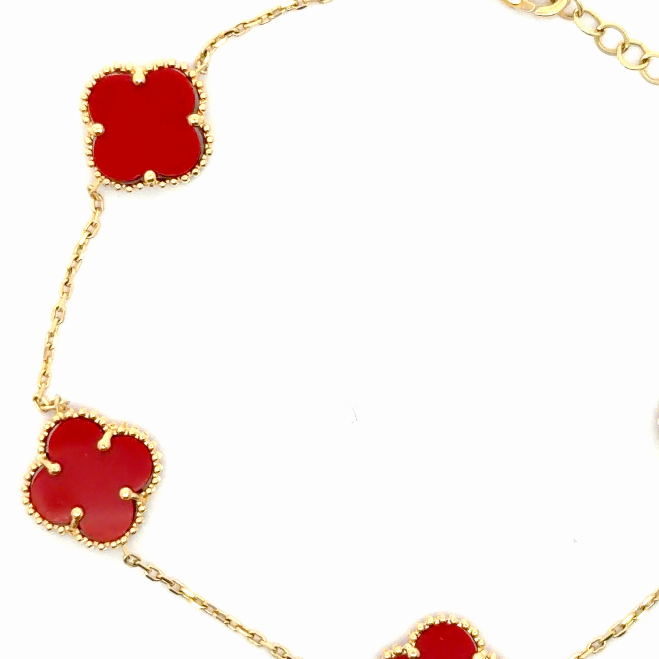 Elegant Yellow Gold Chain Bracelet with Red Clovers