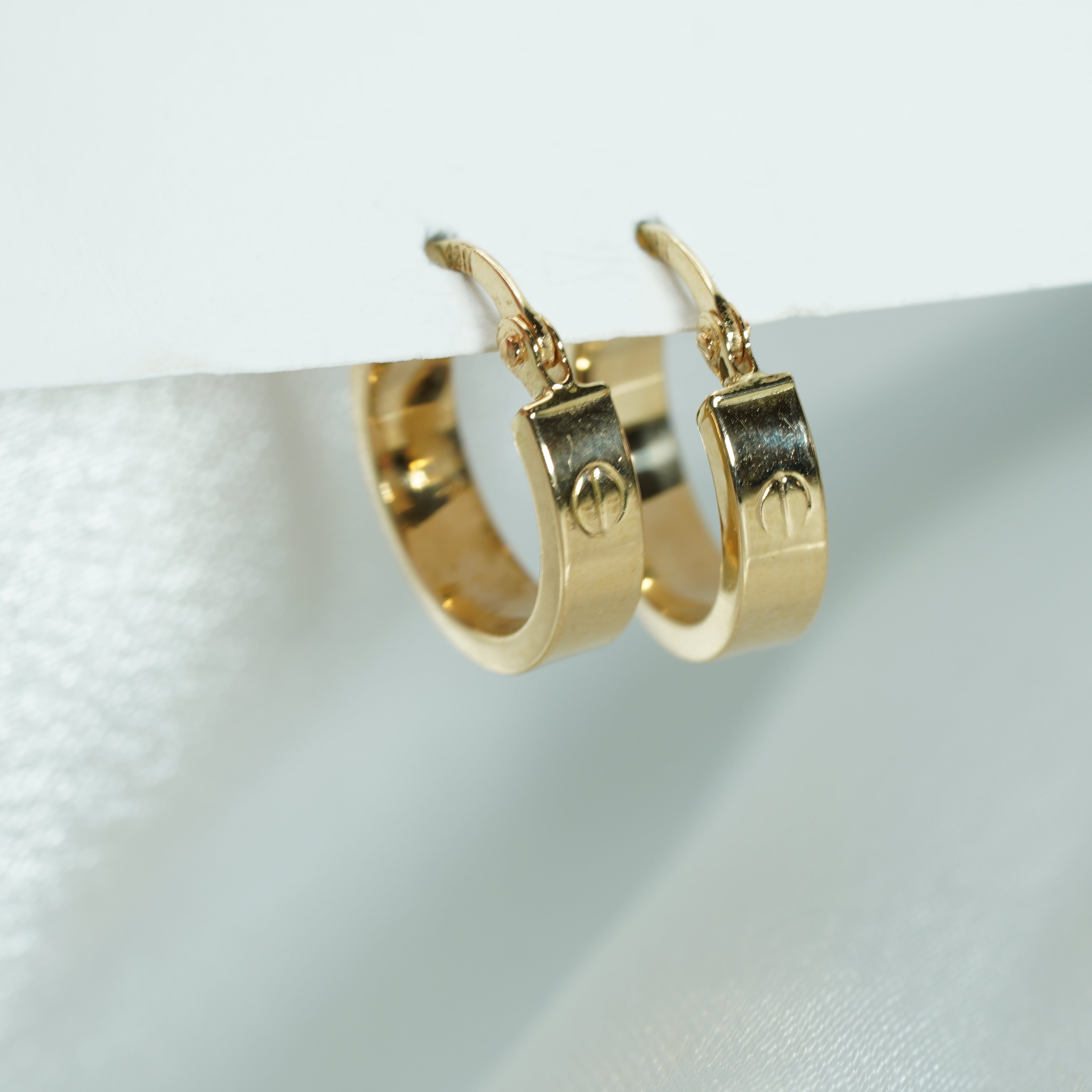 Wide Flat Profile Hoop Earrings in Yellow Gold