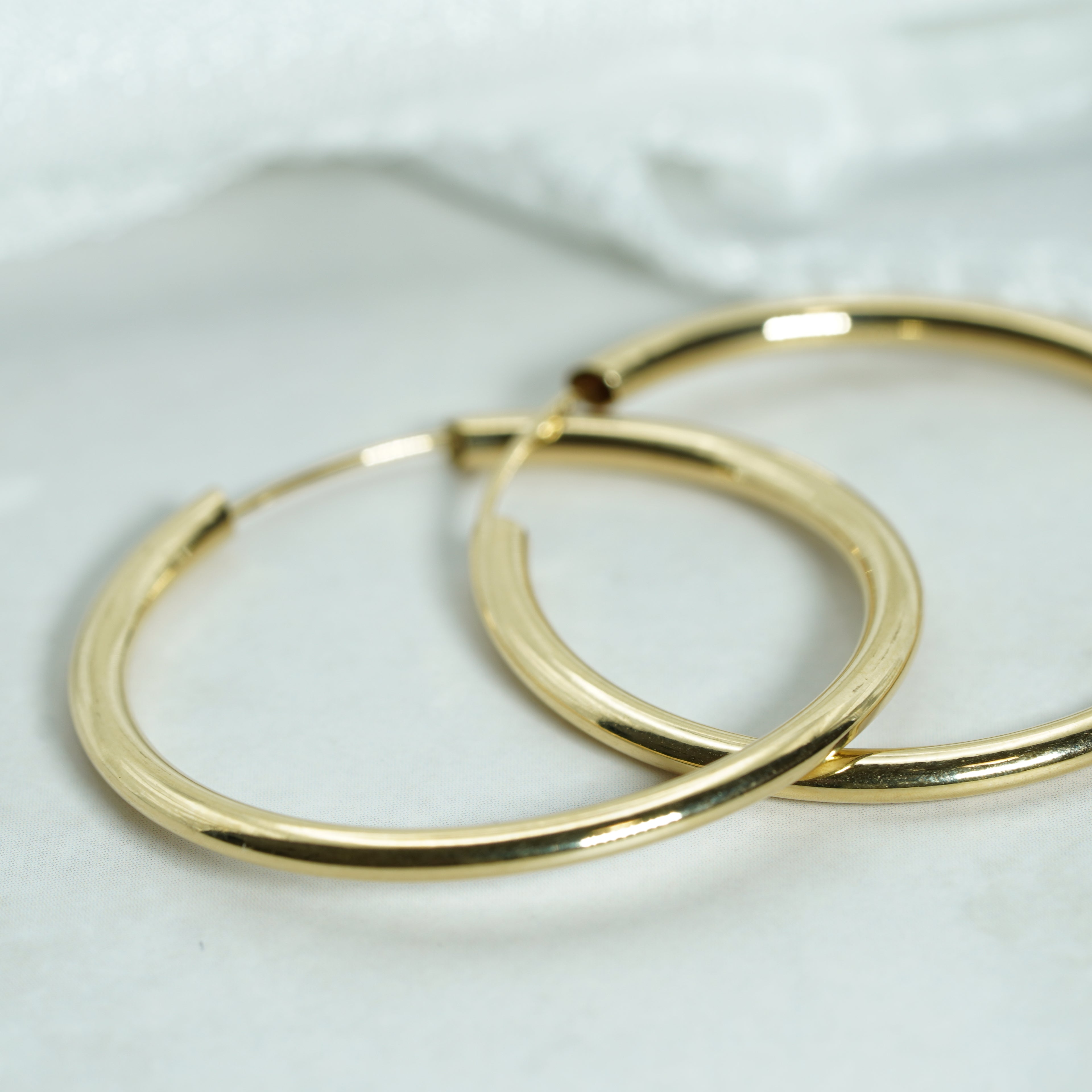 Polished Yellow Gold Endless Hoop Earrings