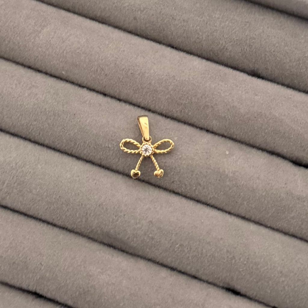 Yellow Gold Zircon Bow Pendant with Heart Accents