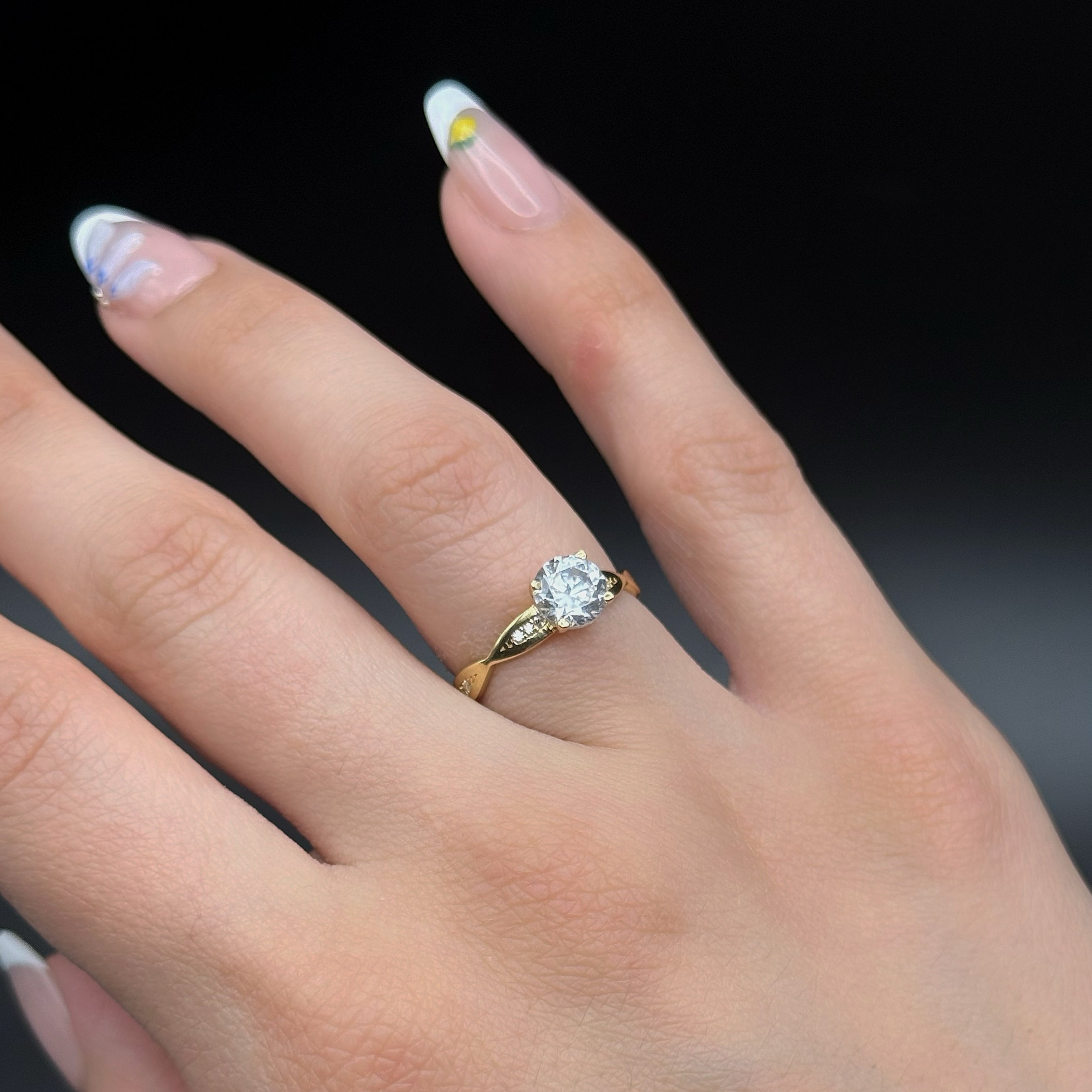 Yellow Gold Zircon Ring with Twisted Accent Band