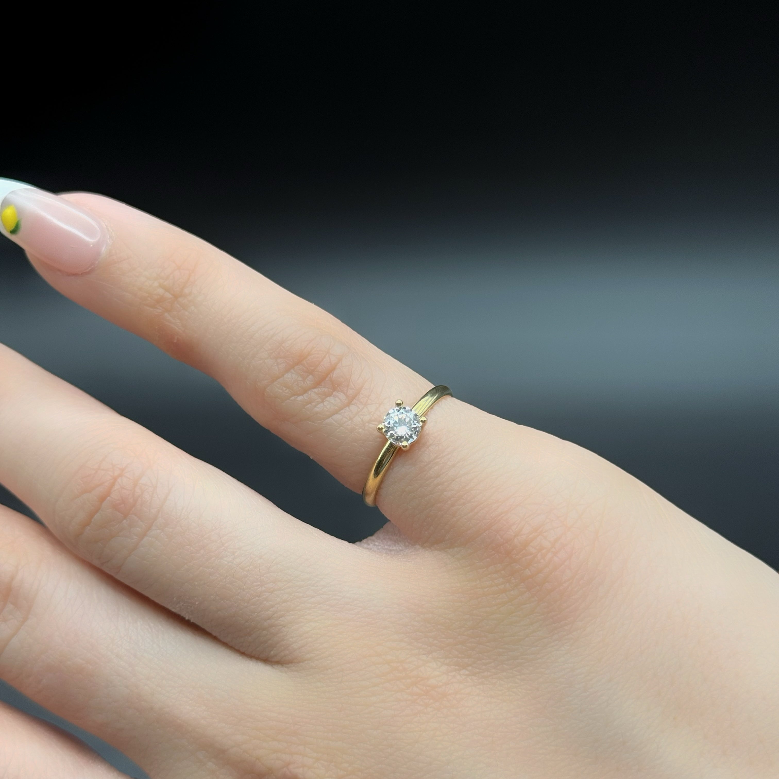 Round Zircon Solitaire Ring in Yellow Gold