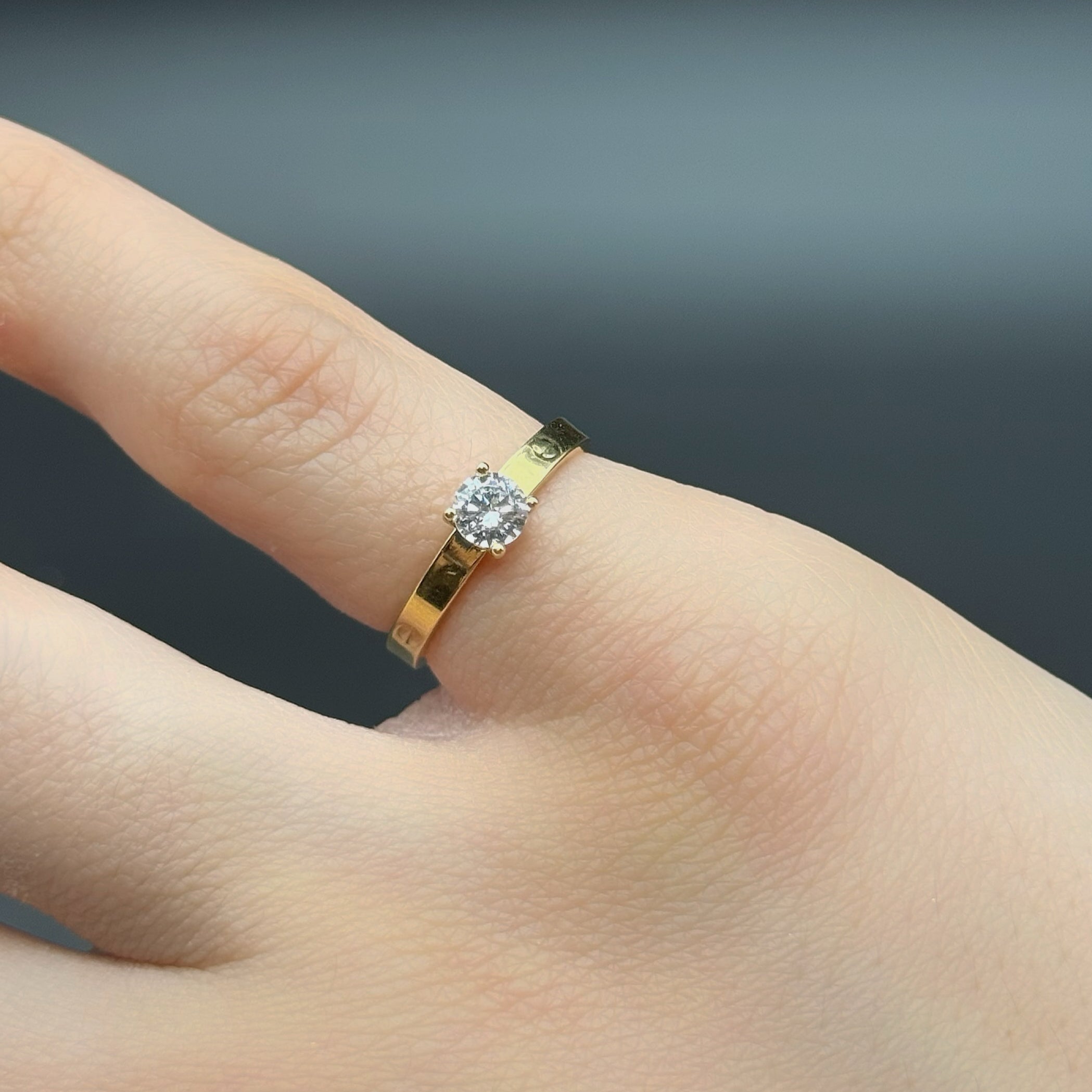 Round Zircon Solitaire Ring in Yellow Gold