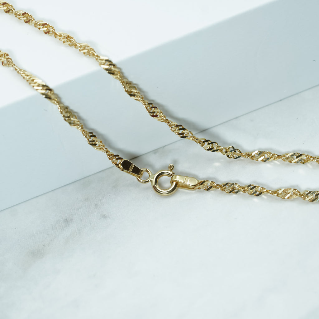 Zirconia Sunburst Charm Necklace in Yellow Gold