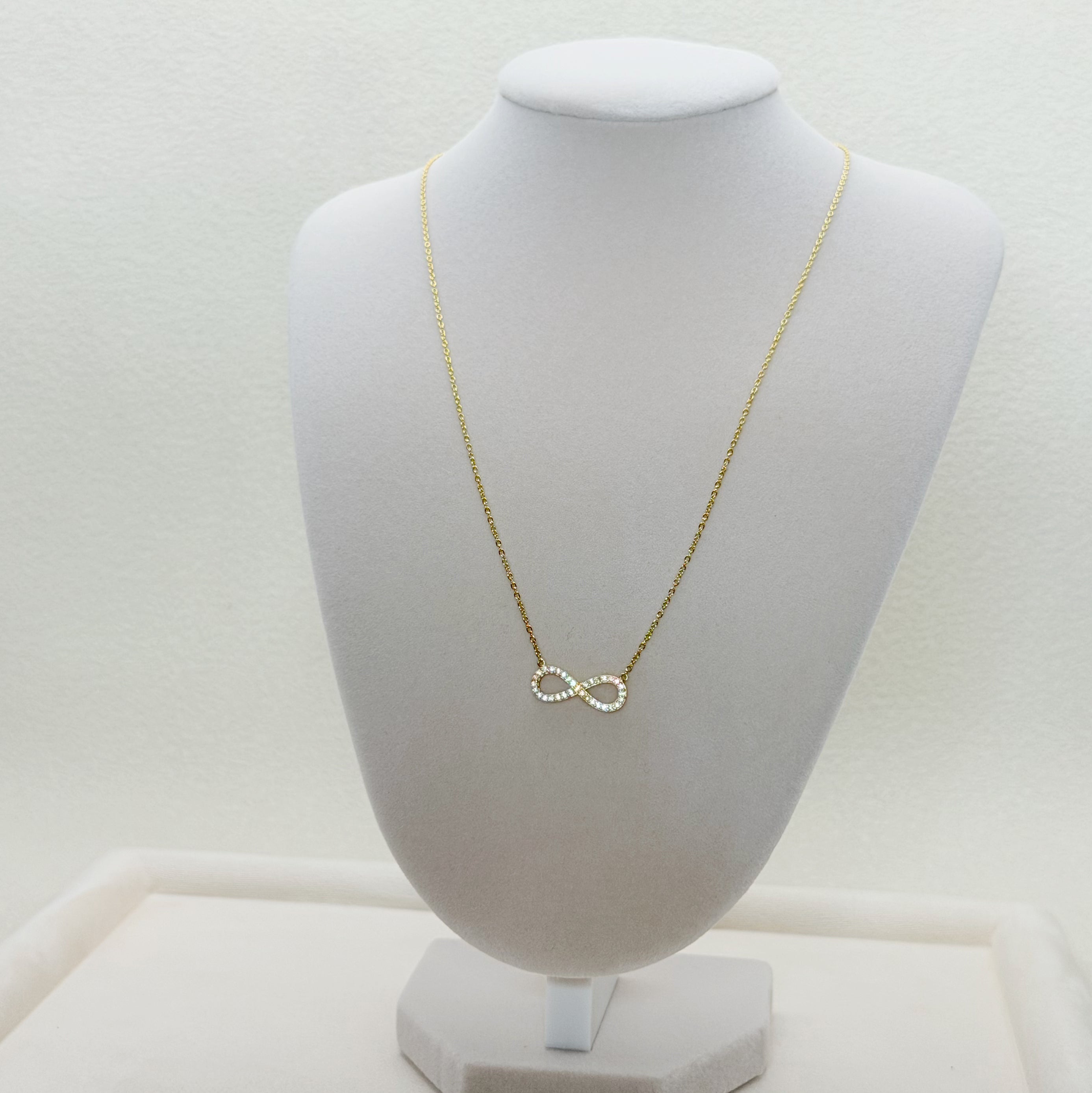 Zirconia Infinity Pendant Necklace in Yellow Gold