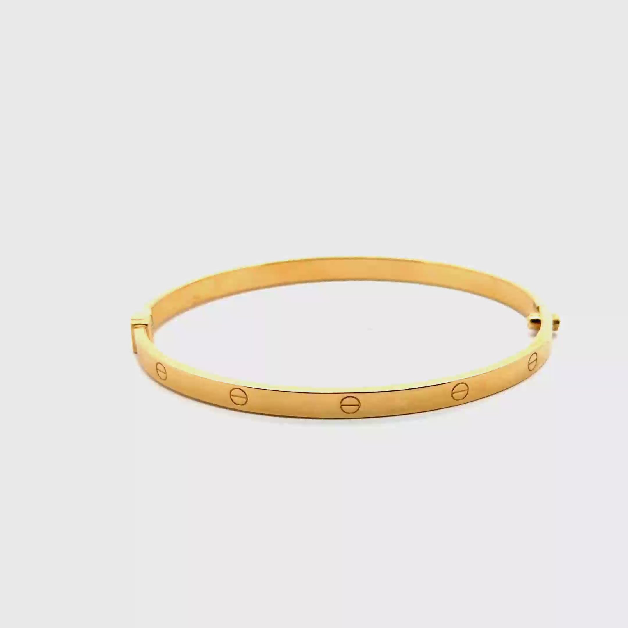 Classic Yellow Gold Bangle with Engraved Accents